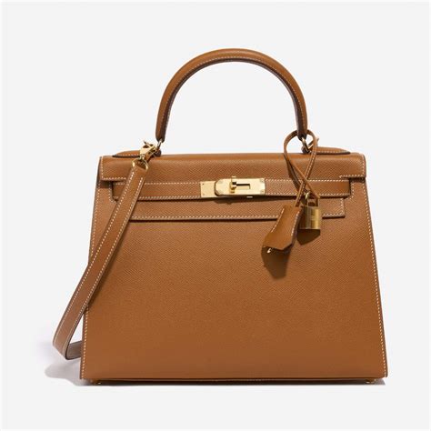 hermes kelly 28 gold ราคา|hermes kelly bag logo.